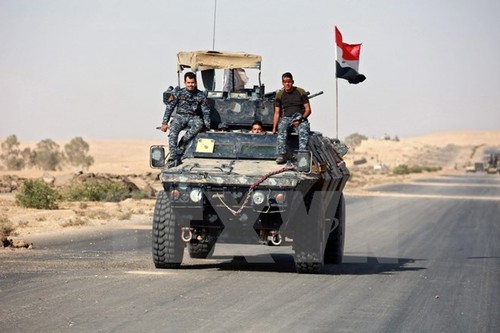 Irakische Streitkräfte bewegen sich zum ersten Mal über Stadtgrenze von Mossul  - ảnh 1